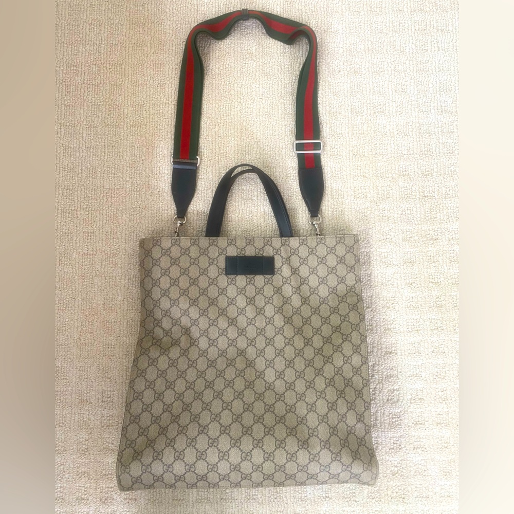 Authentic Gucci tote bag with signature Gucci logo and strap
